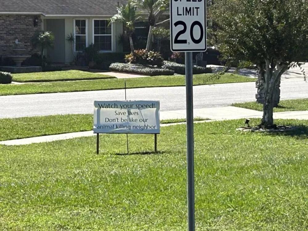 An angry neighbor puts up an unusual sign in their front garden